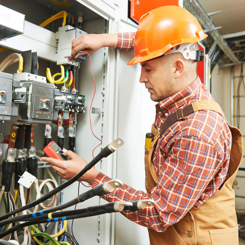 electrician repairing a panel