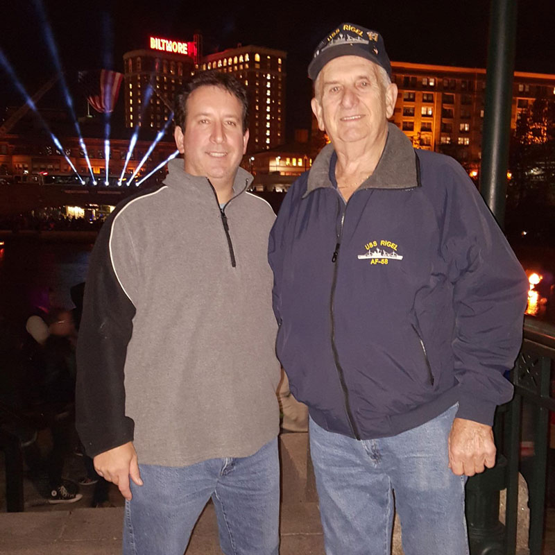 two guys smiling